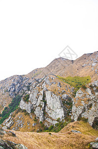 高峰的山边地球木材山麓顶峰远景森林垂直度山顶树林山腰图片