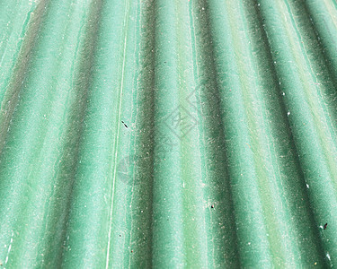 旧绿色金属屋顶纹理边界控制板涟漪线条瓦楞建造拉丝栅栏床单材料图片