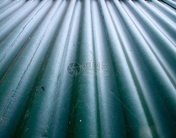 旧绿色金属屋顶纹理盘子床单波纹建造瓦楞线条栅栏控制板边界材料图片