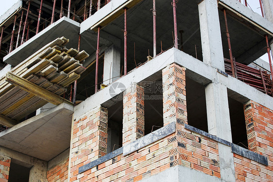 建筑工地工人天空建造工作工程男性生长水泥基础设施脚手架图片