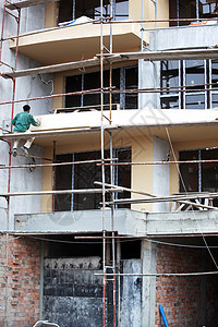 建筑工地商业项目脚手架建造蓝色基础设施公寓工作生长水泥图片