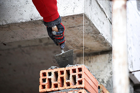 建筑工砖工人砖匠修理瓦工劳动者职业技术头盔工匠石头职场石匠图片