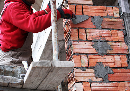 建筑工砖工人砖匠工匠维修男人安装职场砂浆瓦工技术石头职业图片