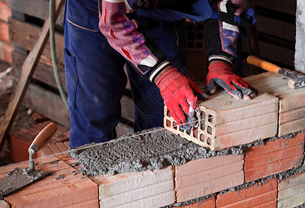 建筑工砖工人砖匠石头石工石匠砂浆维修头盔水泥工作男人劳动者图片
