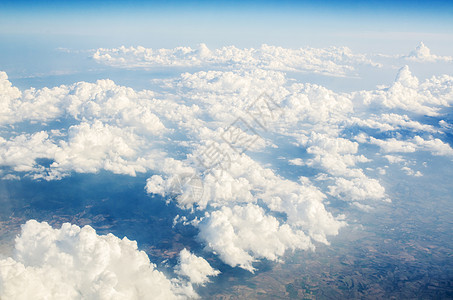 从空中上取来的云蓝色天气天堂风景窗户全景气象自由云景场景背景图片