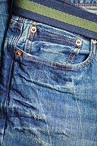 蓝色牛仔裤织物裤子口袋靛青衣服宏观服装服饰棉布纺织品图片