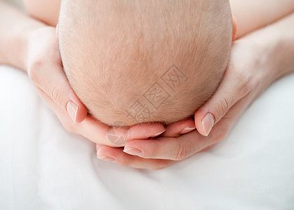 亲子关系棕榈压痛按摩父母女士皮肤家庭童年生活婴儿图片