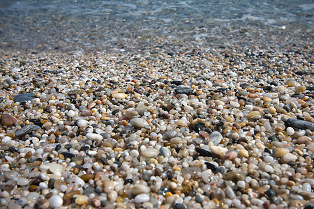 海滩上的小石头粮食碎石海岸热带岩石卵石图片