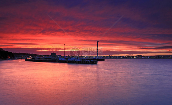 英国威茅斯海滨支撑港口蓝色天空假期日出太阳日落旅行海洋图片