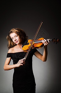 演播室有小提琴的女演员木头大提琴独奏艺术大提琴手演奏家交响乐细绳女性娱乐图片