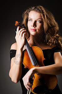 演播室有小提琴的女演员娱乐音乐会木头作品女性协奏曲独奏艺术大提琴交响乐图片