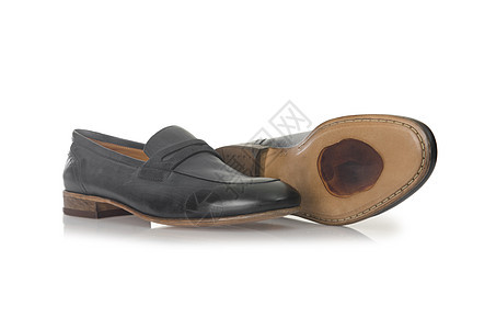 白色男性鞋子的时装概念男人齿轮脚跟鞋类橡皮正装皮革反射骡子靴子图片