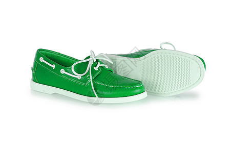 白色男性鞋子的时装概念反射男人靴子鞋类绿色皮革正装脚跟橡皮骡子图片