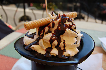 冰雪巧克力奶油晶圆糖果食品背景图片