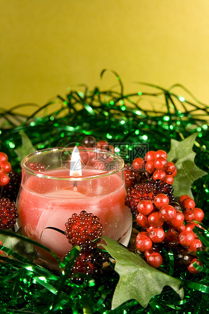 带点蜡烛的圣诞装饰品金子飘带礼物红色珠子火花玩意儿图片