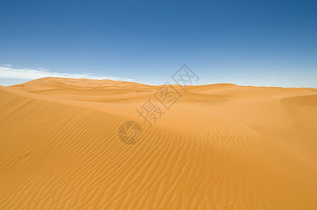 沙丘地标天空晴天水平旅行干旱冒险孤独蓝色图片