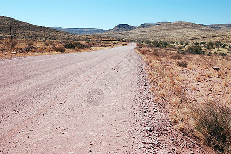 在路上旅行司机自由驾驶天空运输寂寞路面孤独沙漠图片