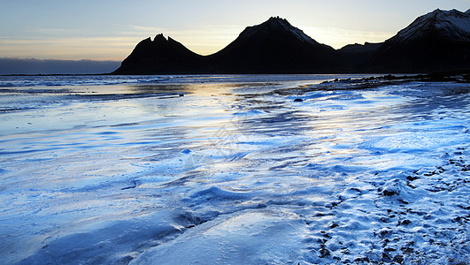 冰岛冷冻海岸海滩蓝色环境火山旅行海洋天空日落海岸线风景图片