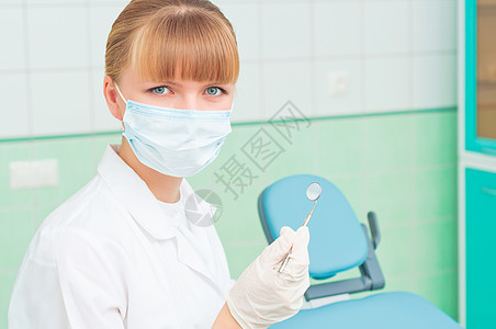 戴保护面罩的女牙医药品保健工作手术微笑临床牙科男性情况女孩图片