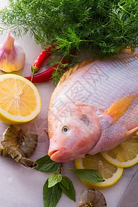 尼罗河蒂拉皮亚鱼工具钓鱼饮食宏观海鲜厨房螃蟹眼睛钢巴贝类图片