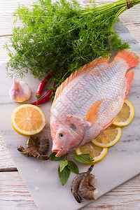 尼罗河蒂拉皮亚鱼工具贝类美食食物营养宏观饮食盘子海鲜钢巴图片