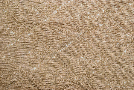 编织结构手工织物针织蕾丝毛衣工艺棕色背景图片