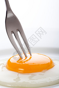 太阳蛋民间橙子早餐金属半生椭圆形餐具美食蛋黄健康饮食图片