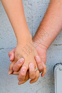 情侣握手女士家庭男人婚姻手指背景图片