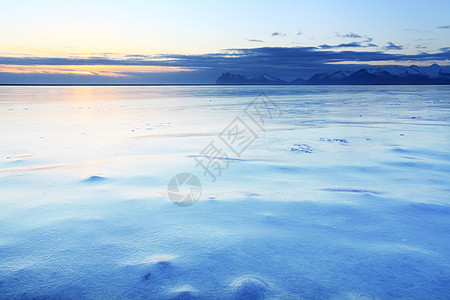 冰岛冷冻海岸假期蓝色海滩日落荒野天空地平线环境海岸线风景图片