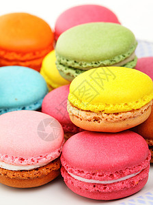 色彩多彩的马卡龙粉色绿色美食味道黄色糖果甜点橙子蛋糕饼干图片