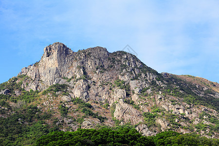 狮子摇滚爬坡地标岩石蓝色天空市中心精神头脑晴天城市图片