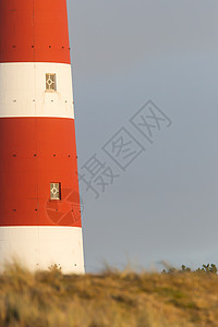 红色和白色灯塔建筑学海岸建筑栅栏港口天空指导海洋条纹雷达图片