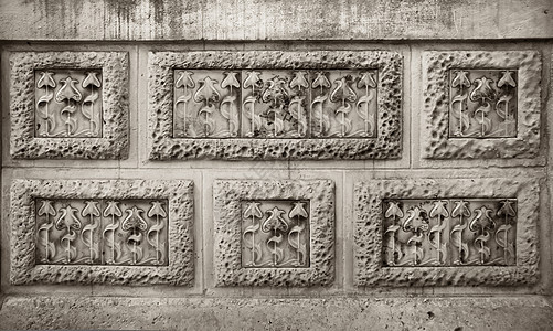 在石墙上雕刻的现代花朵花园工艺文化现代主义者砂岩雕塑墙纸建筑学宽慰艺术图片