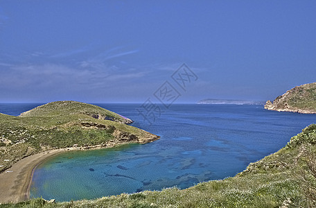 玛尼湾海岸岩石海滩背景图片