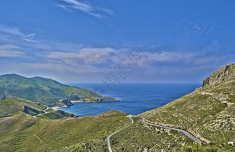 玛尼湾海岸岩石海滩背景图片