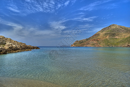 玛尼湾海岸海滩岩石背景图片