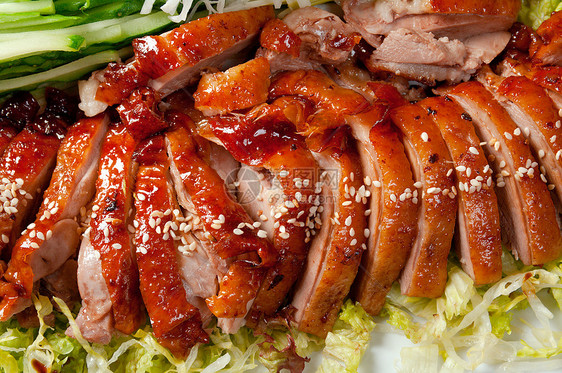烤鸭 中式鸭子红色烹饪皮肤家禽香料炙烤主菜洋葱菜肴图片