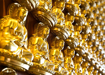 泰国中国寺庙墙上挂许多小佛像的雕像纪念碑艺术教会蓝色大厅宗教绘画雕塑文化古董图片
