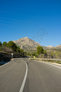 山区公路风景缠绕沥青水平运输日光通道车道图片
