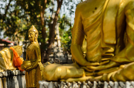 古佛祖崇拜寺庙黄色雕像旅行历史性艺术宗教地标文化背景图片