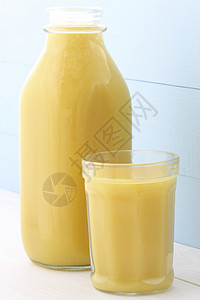 鲜橙汁新鲜的橙汁果汁瓶水果饮料橙色纤维橙子果汁背景