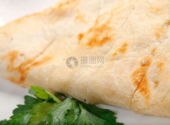 皮塔面包土库木食物面包脆皮棕色小麦白色面粉图片