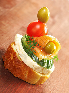 含有熏鲑鱼的甘蔗小吃点心面包食物摄影熏制橙子午餐美食胡椒图片