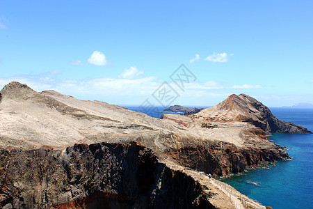 葡萄牙马德拉岛边缘阳光蓬塔冲浪岩石爬坡海景假期旅游海岸线图片