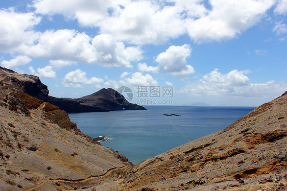 葡萄牙马德拉岛阳光热带悬崖蓬塔天空太阳海洋火山旅行旅游图片