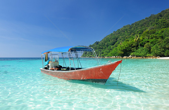 美丽的海滩 有机动船海洋旅行摩托艇运动汽艇游艇地平线天空边缘力量图片