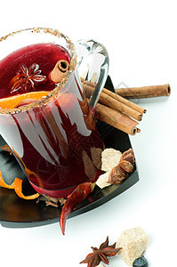 混合葡萄酒和水果季节红色黑碟茶点香料脆弱性甜饮肉桂棒色彩八角图片