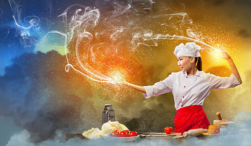 亚洲女性用魔法烹饪成人魅力饮食食物围裙杯子女孩空气蔬菜魔术师图片