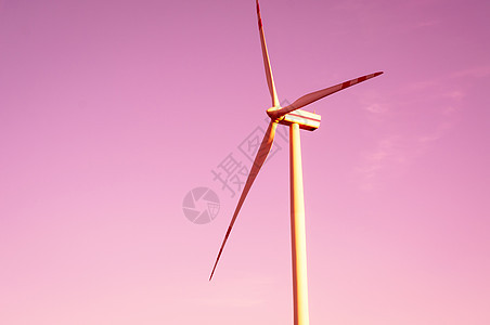 黄昏时的风涡轮照片日落涡轮机产业环境水平风车太阳摄影彩色图片
