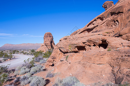火谷岩石沙漠天空爬坡旅行悬崖公园砂岩编队植物图片